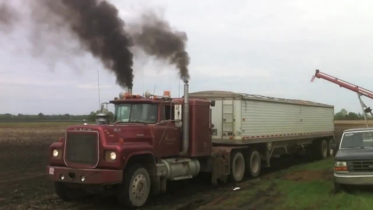 1978 Model Mack RL 700 Pulls 25 Tons Load Of Wheat Through Sticky Mud