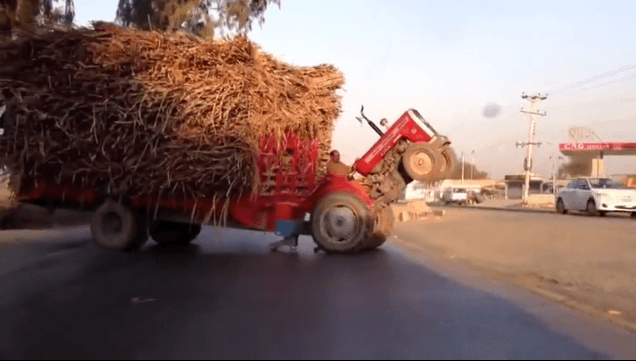 Farmers In India: Towing An Overloaded Trailer With A Too Little Power 